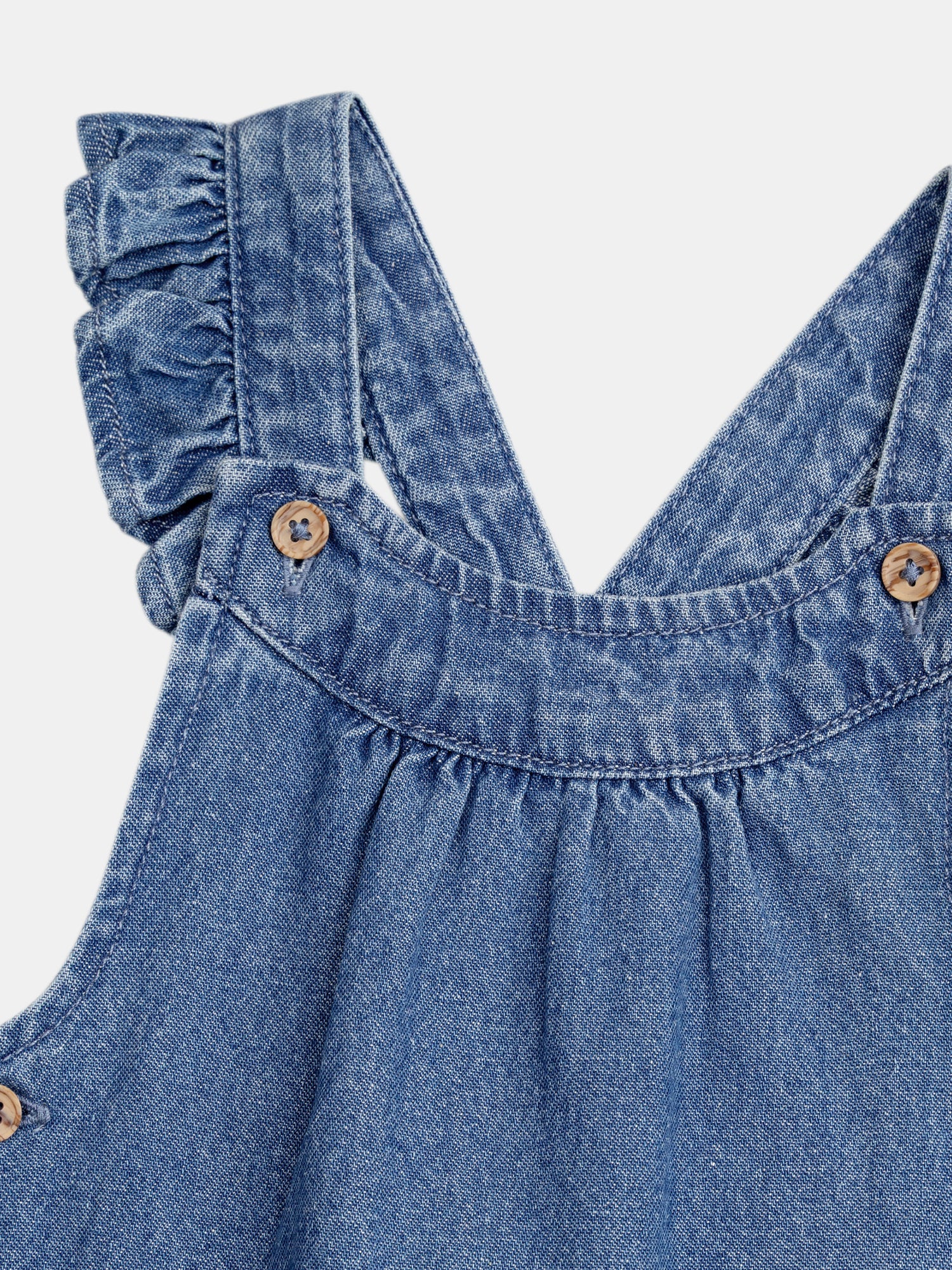 Denim overalls with embroidered heart pockets for baby girl