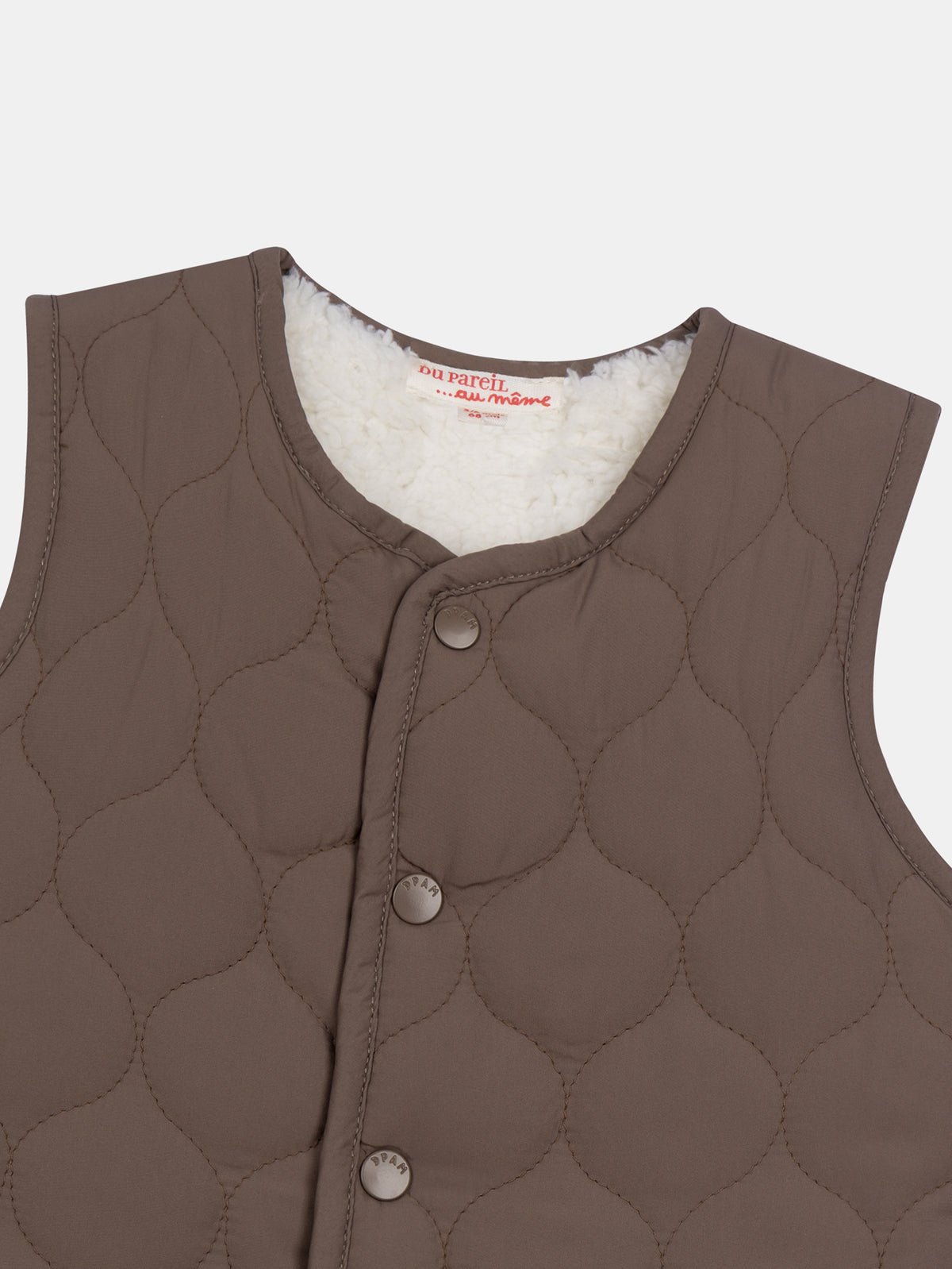 Reversible cocoa and ecru sleeveless vest for baby boy