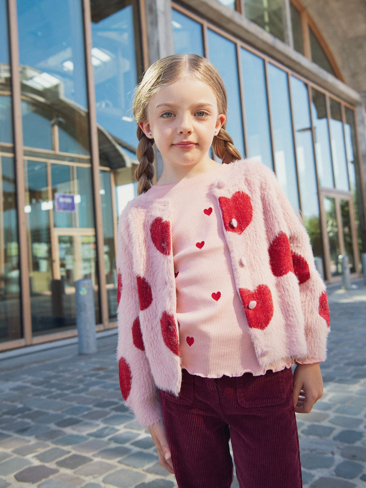 Pink cardigan with heart pattern for girls