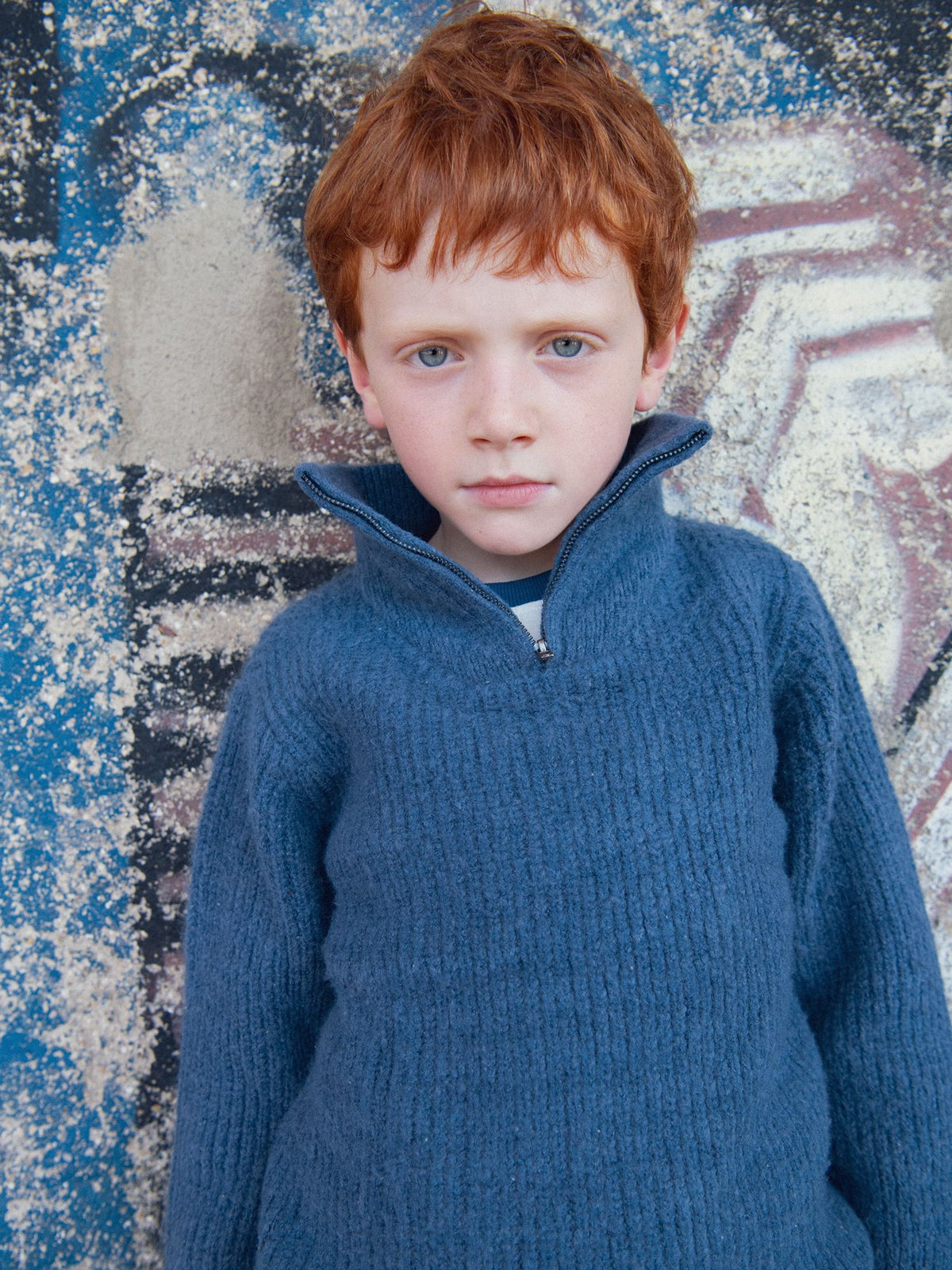 Blue marl jumper with a high neck for boys