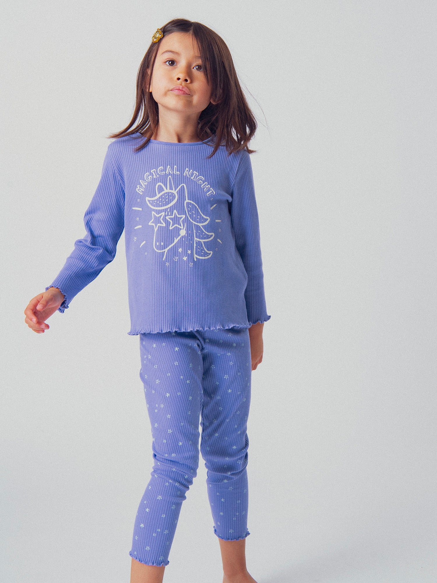 Purple pyjama with phosphorescent unicorn pattern for girl