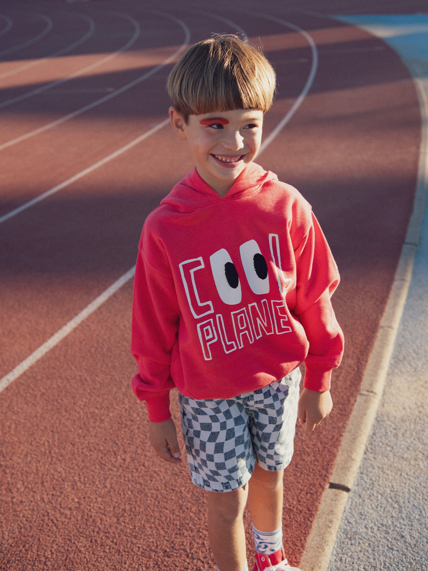 Red sweatshirt with animation and hood for boys