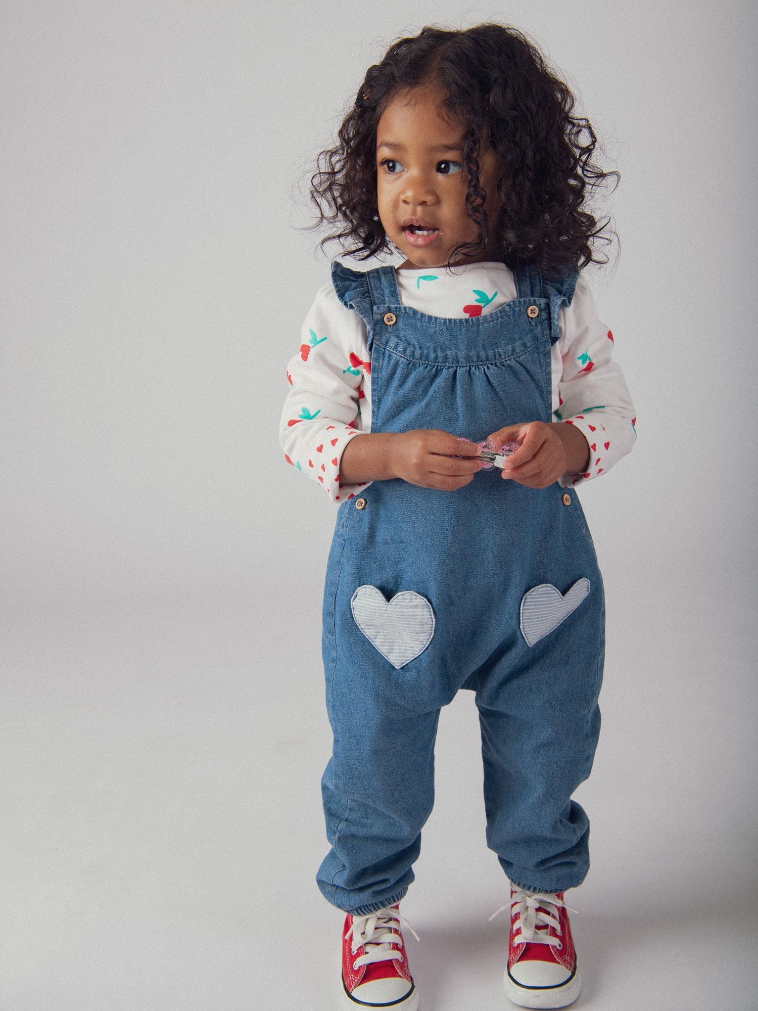 Denim overalls with embroidered heart pockets for baby girl