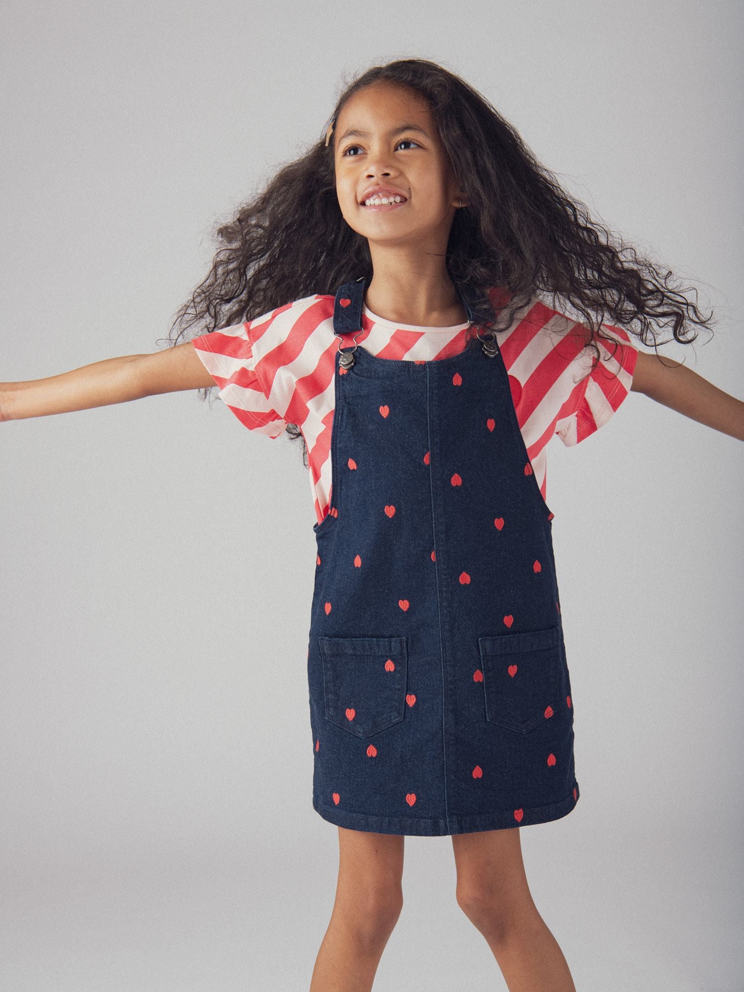 Blue denim pinafore dress with heart embroidery for girls