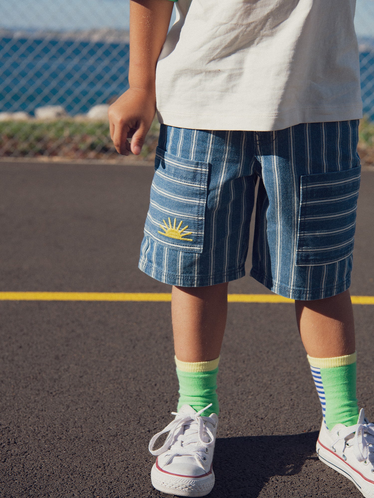 Blue striped shorts with pockets for boys