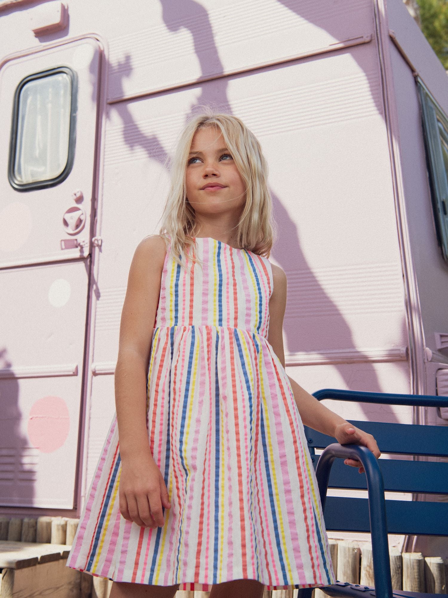 Cream dress with multicolored stripes for girls