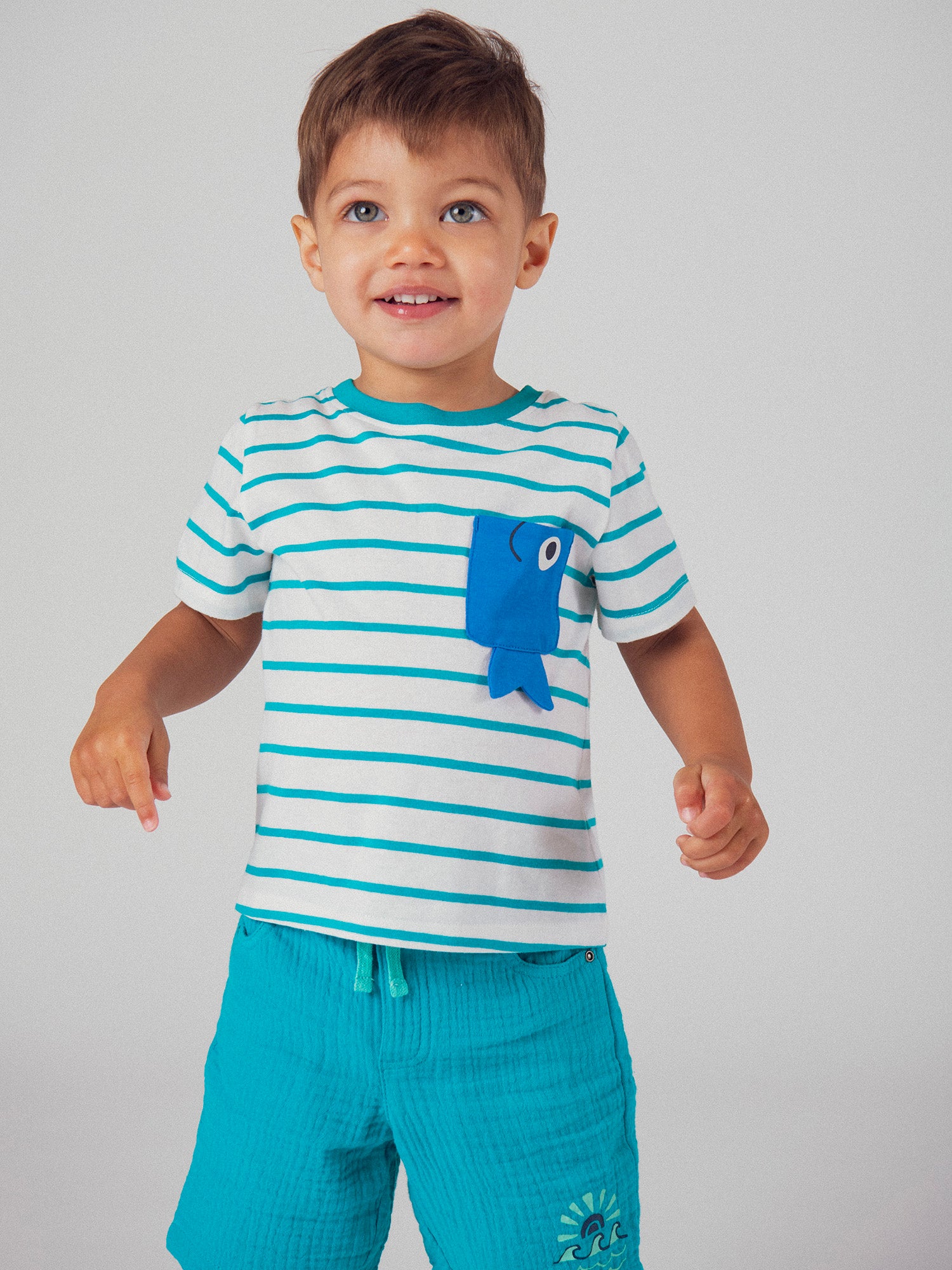 Striped turquoise t-shirt with fish pocket for baby boy