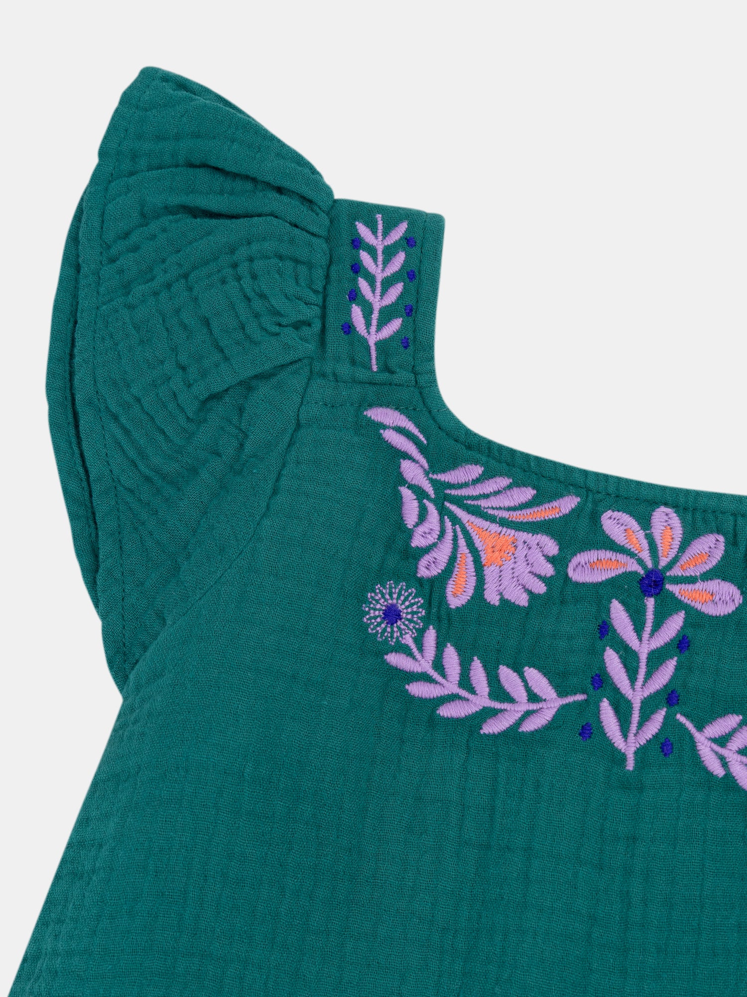 Green blouse with floral embroidery for girl