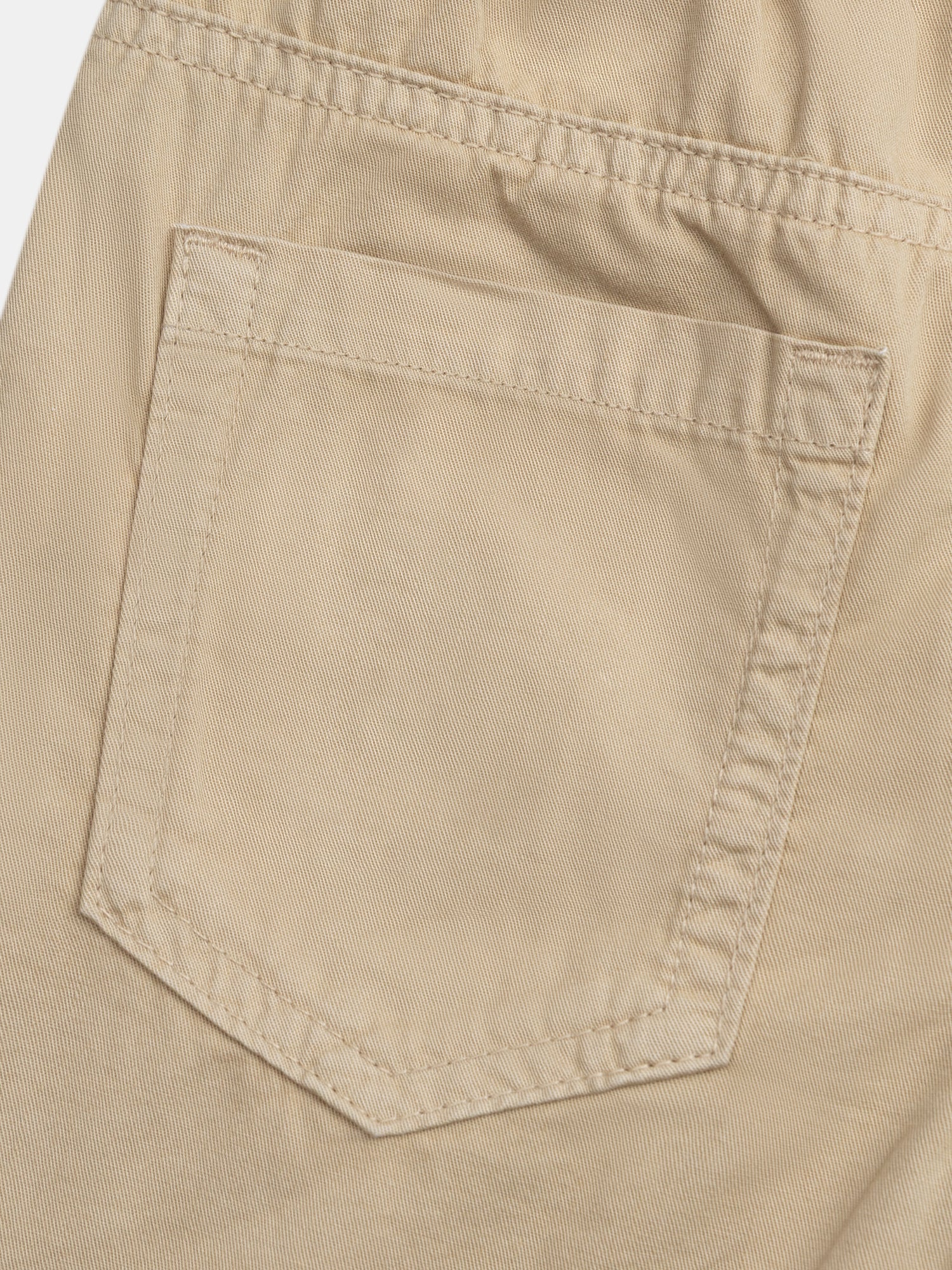 Beige shorts with front and back pockets for boys