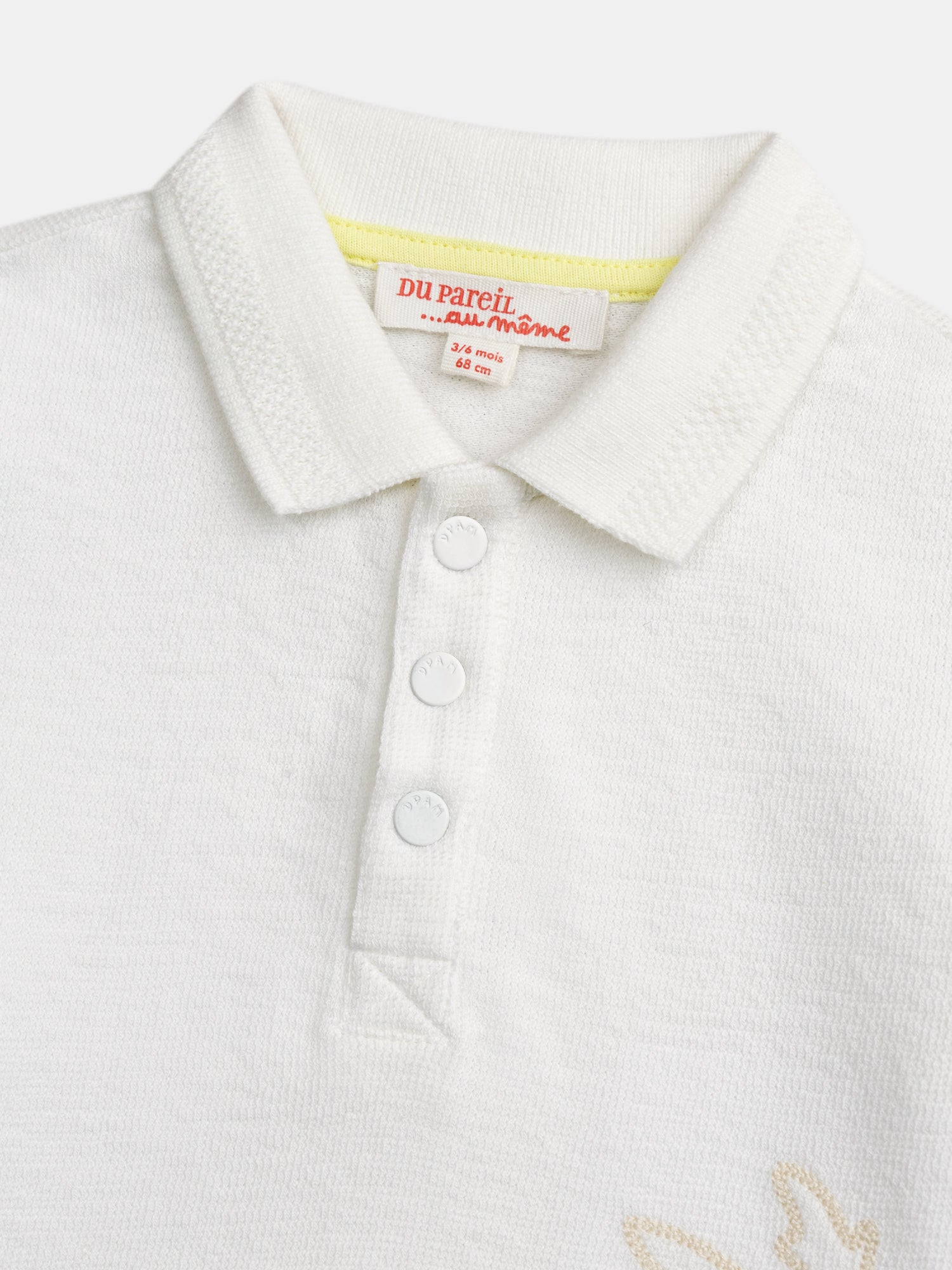 Ecru polo with palm embroidery for baby boy