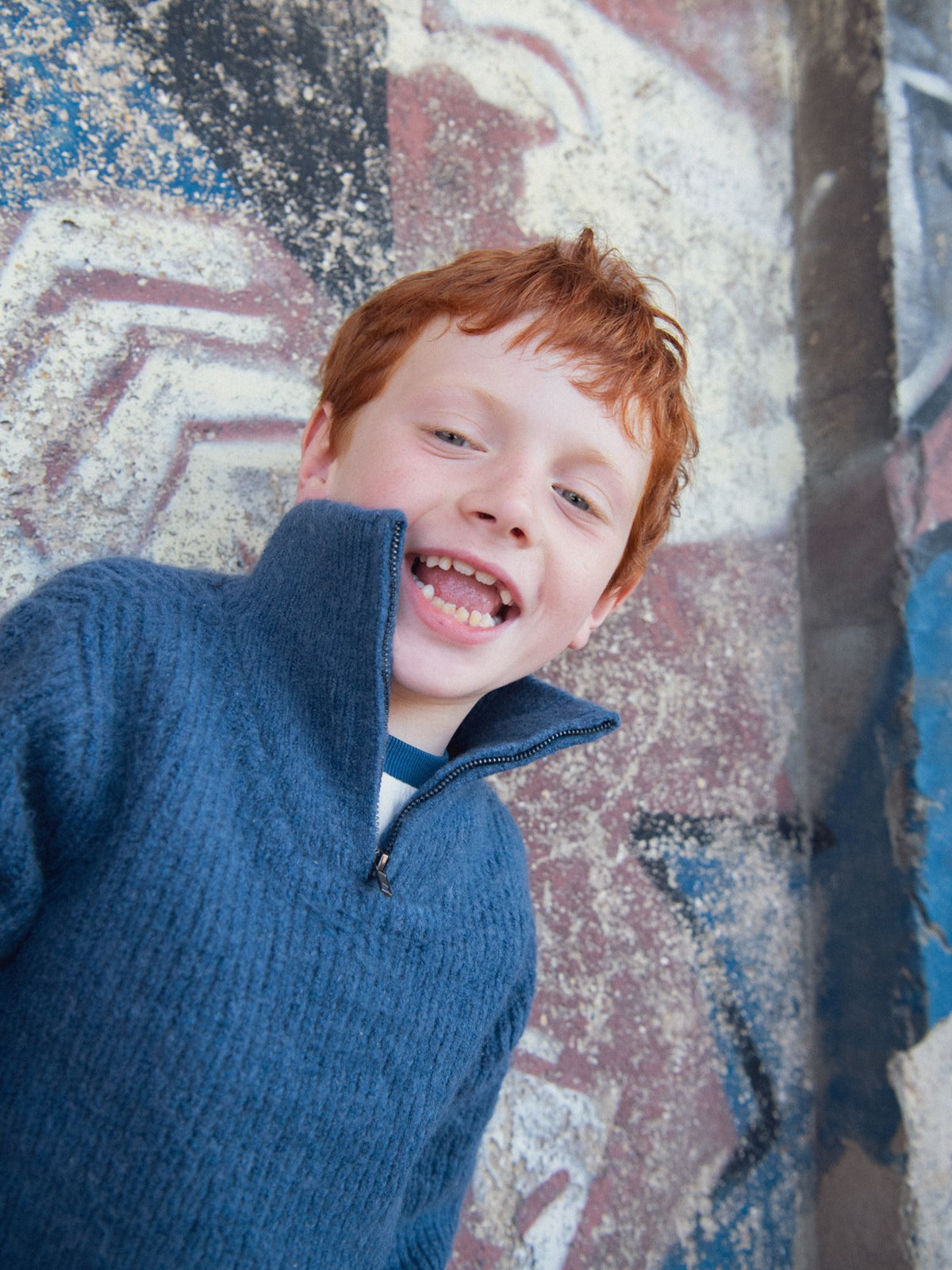 Blue marl jumper with a high neck for boys