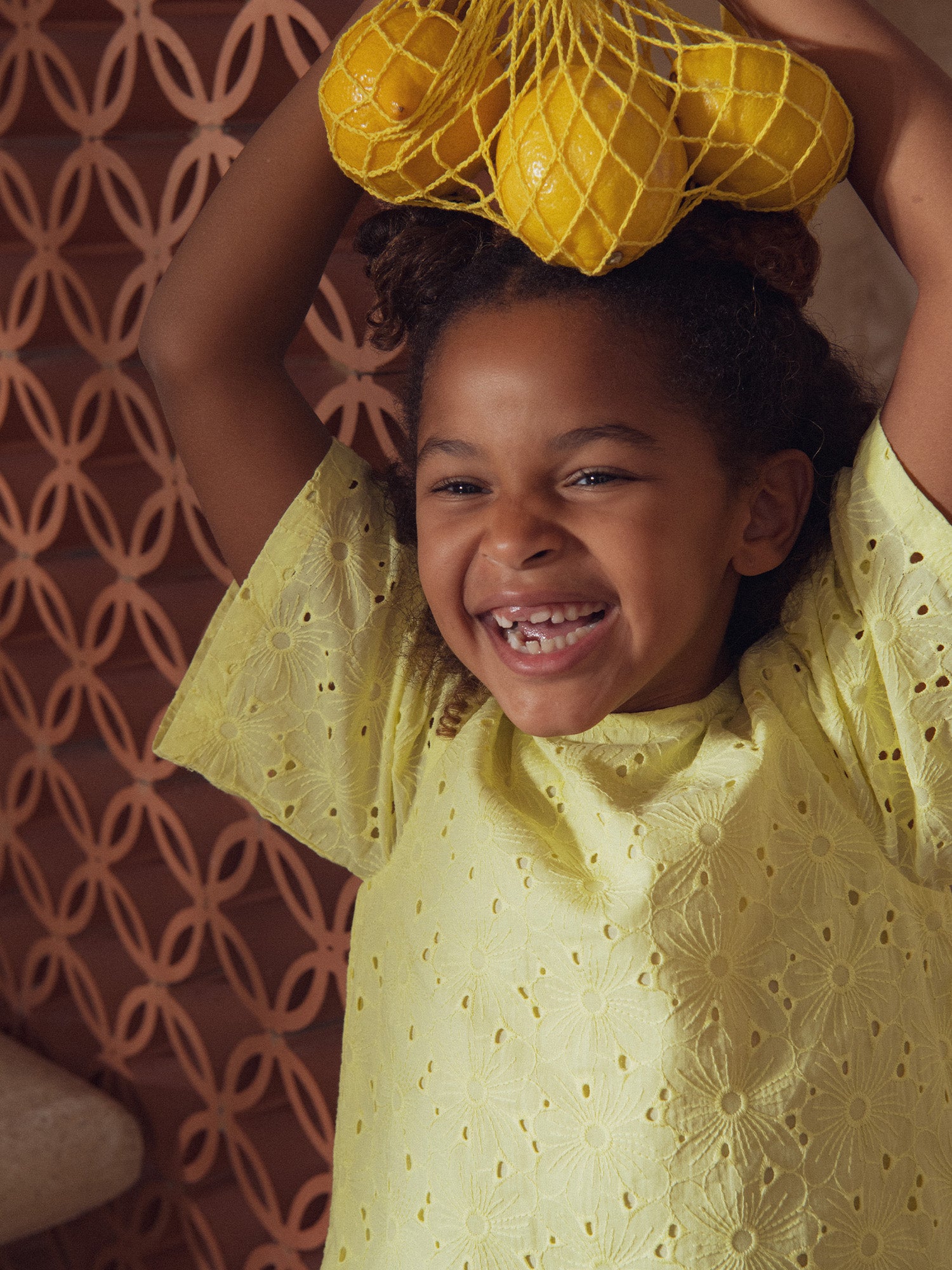 Pale yellow blouse in English embroidery for girls