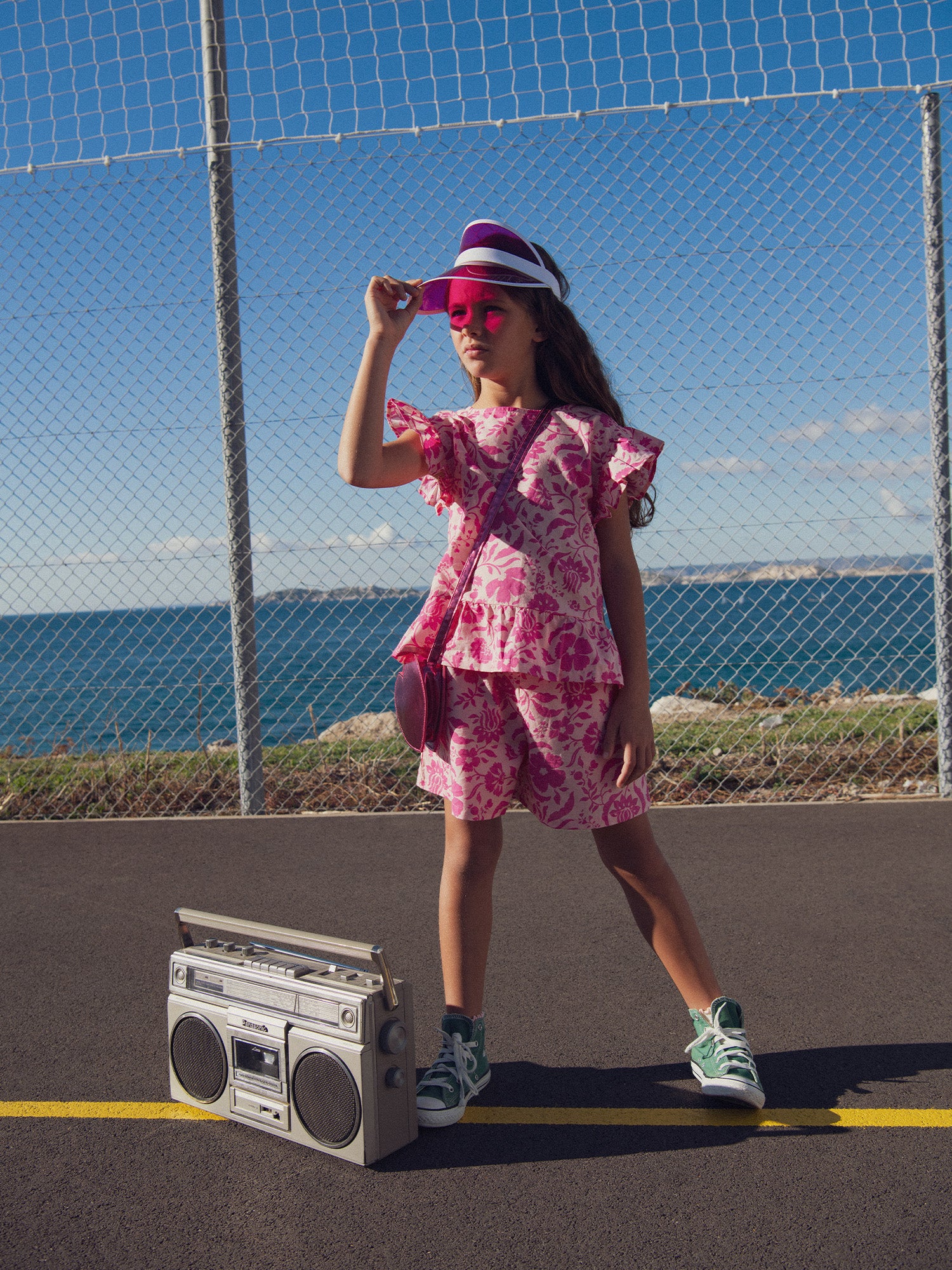 Short pink with floral print for girls