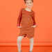 Child girl's short velvet dungarees with cherry print