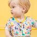 Baby boy's tunisian collar t-shirt with fancy colorful pattern