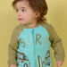 Turquoise waistcoat with surf pattern