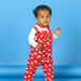 Red and white dungarees with floral print baby girl