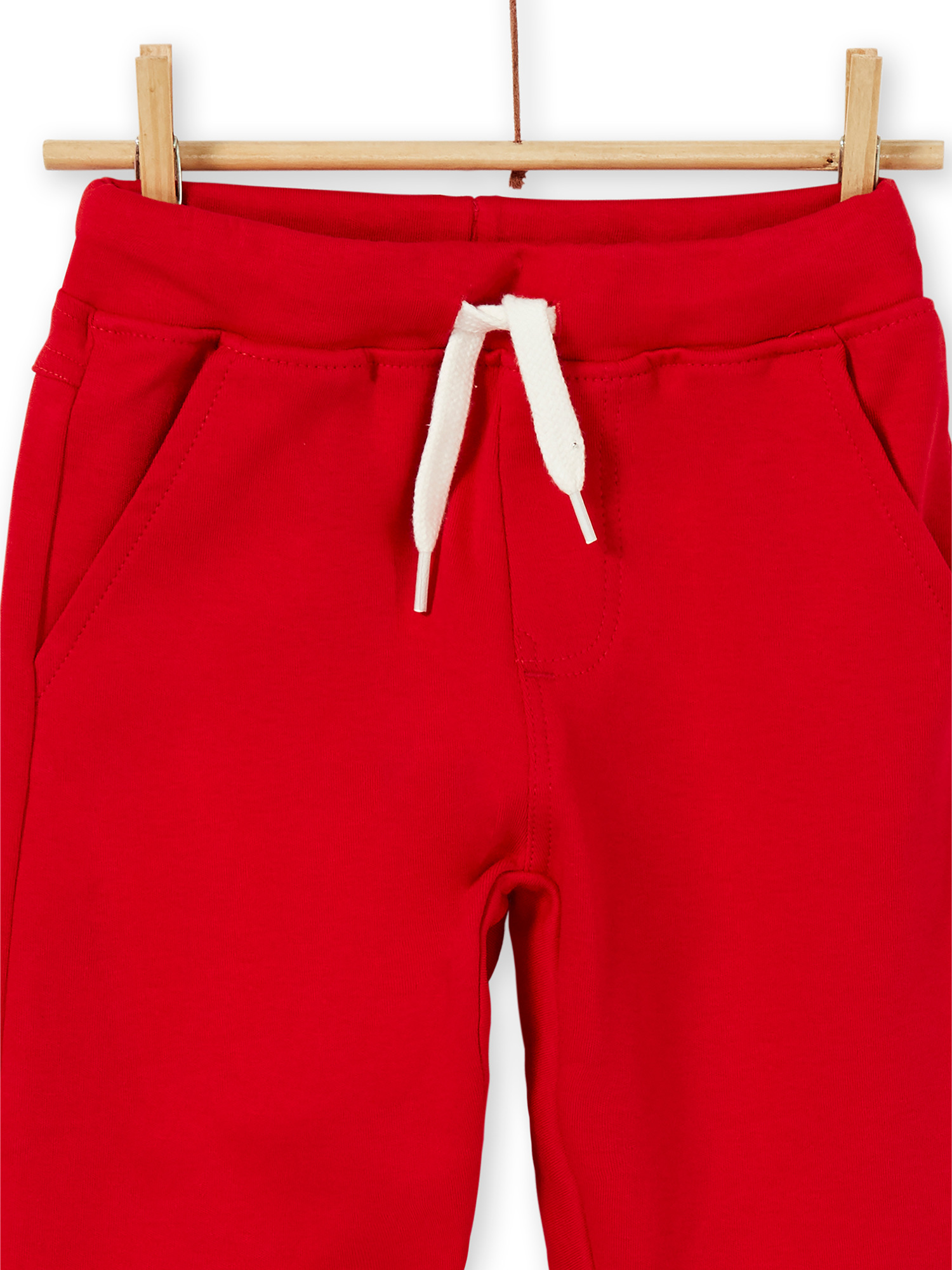 red cotton pants